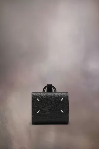 Custodia per AirPod con quattro punti di sutura