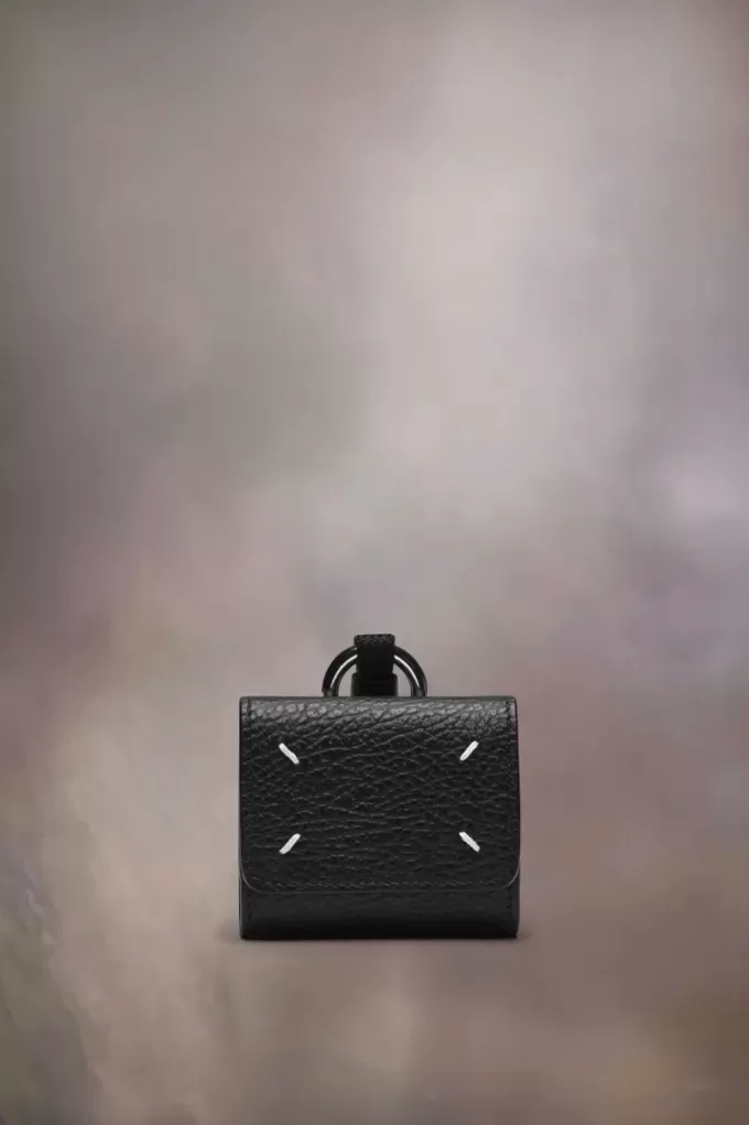 Custodia per AirPod con quattro punti di sutura