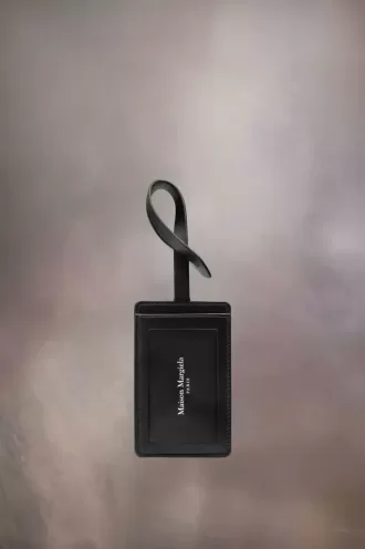 Etichetta per bagaglio con quattro punti