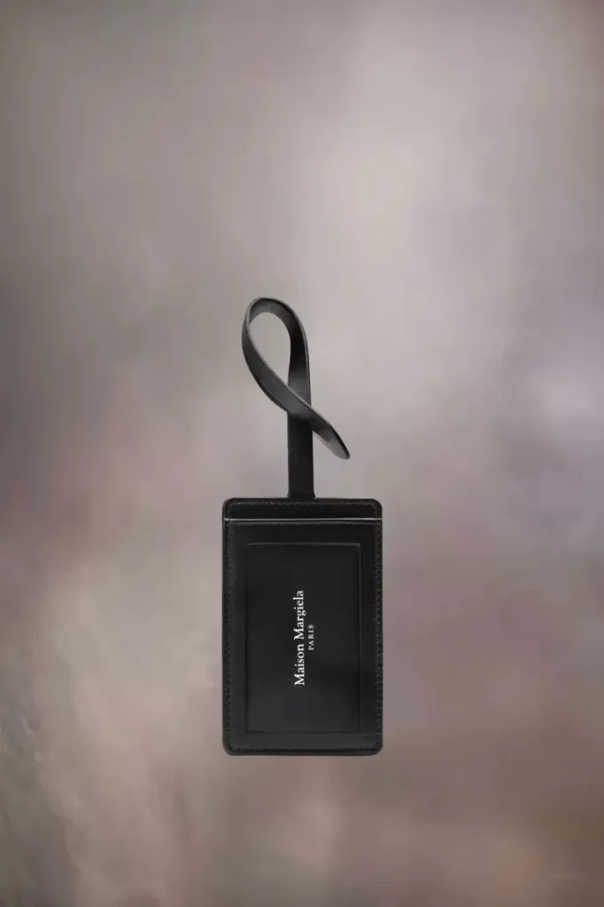 Etichetta per bagaglio con quattro punti